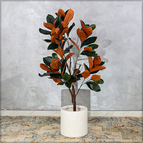 Realistic magnolia flowers on artificial plant