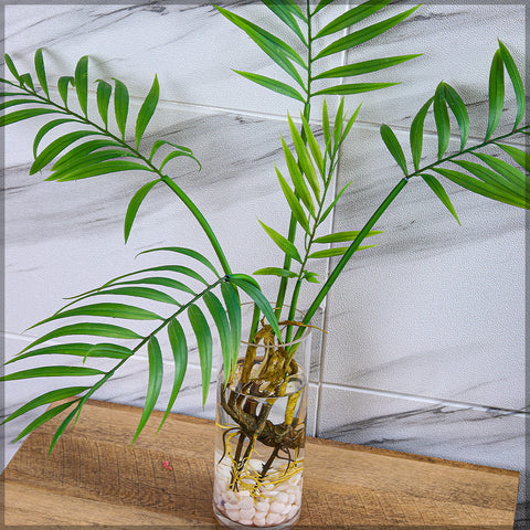 Small artificial palm trees for home decor