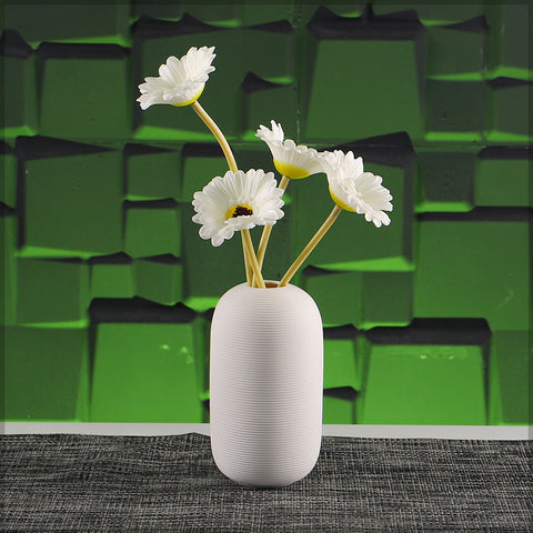 Elegant ceramic vase in white for contemporary spaces