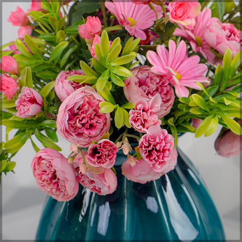 Flower Arrangements with Blue Color Vase