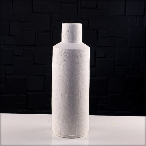 Rustic ceramic vase with a textured finish for home decor