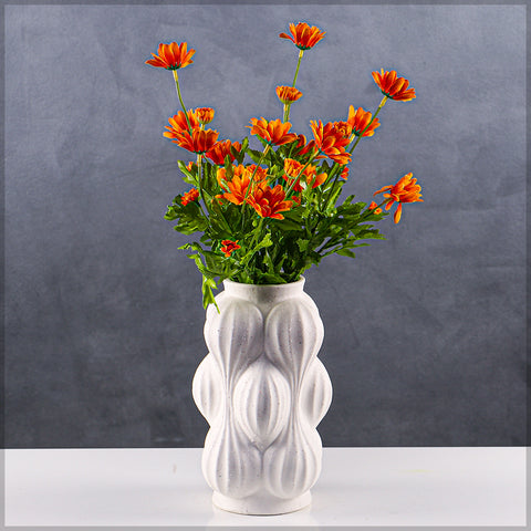 Modern ceramic vase with relief designs