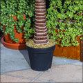 Close-up of a large artificial palm tree 2.5 m with vibrant leaves