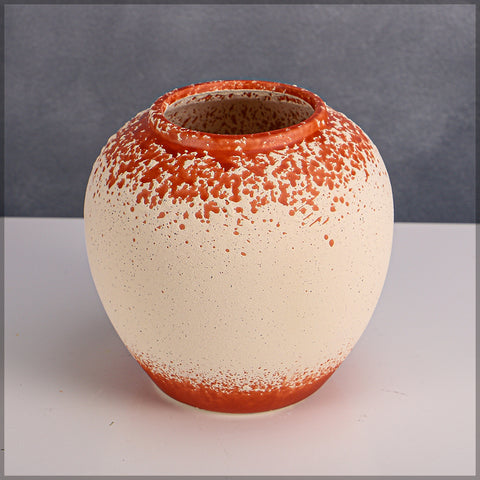 Bold orange white ceramic vases for modern spaces