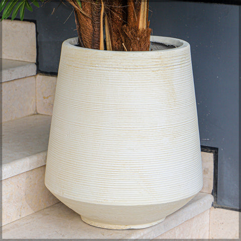 Stylish concrete pots with ridges