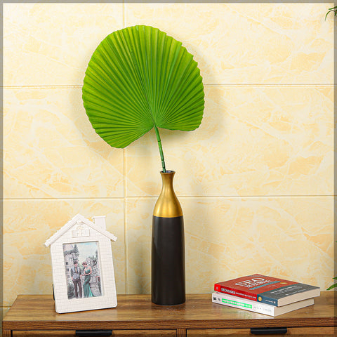 Faux palm leaf for tropical styling