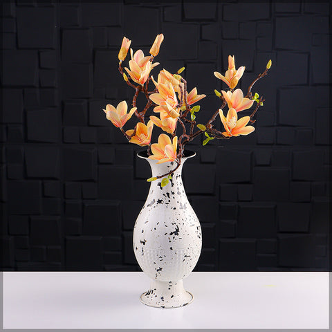 Stylish metal vase for rooms