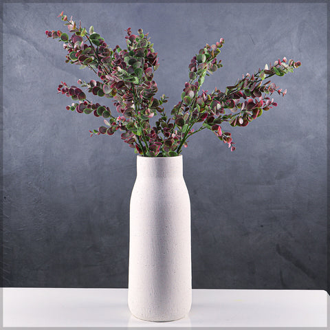 Simple ceramic vase with clean lines for home decoration