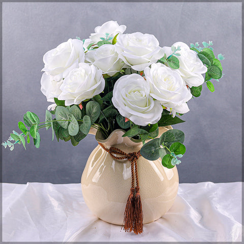 Ribbon accented cream ceramic vase