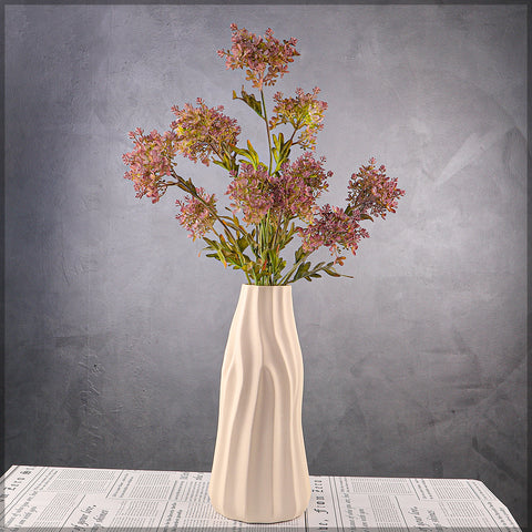 Stylish edged ceramic vase for contemporary interiors