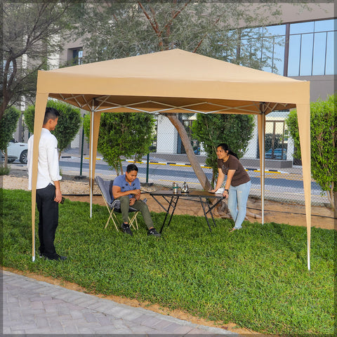 Pop up gazebo providing shade at beach party