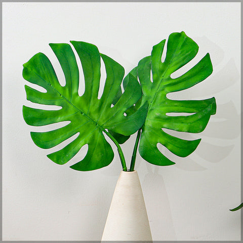 Artificial monstera leaves for garden decoration