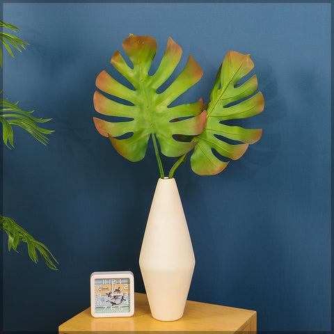 Decorative artificial monstera leaves for indoor styling