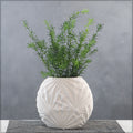 White ceramic round vase with tropical design