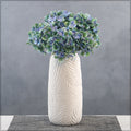 Handcrafted leafy design ceramic vase for contemporary interiors