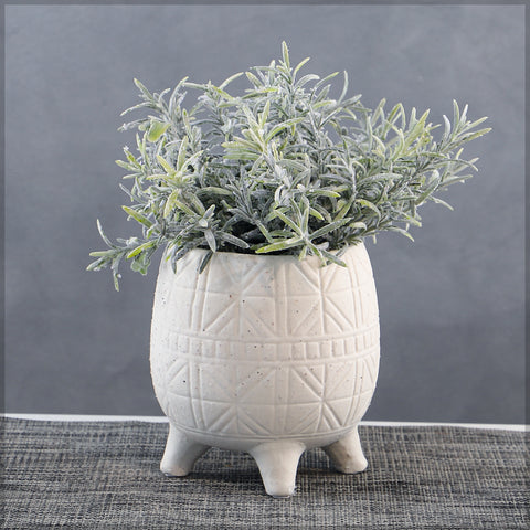 White ceramic planter for indoor plants