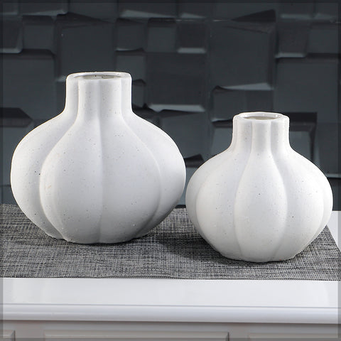 Unique white ceramic vase with garlic inspired design