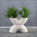 White pottery vase with modern aesthetic