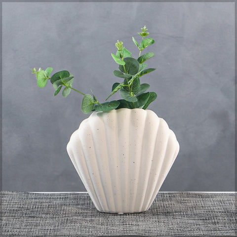 Elegant decorative vase with seashell shape