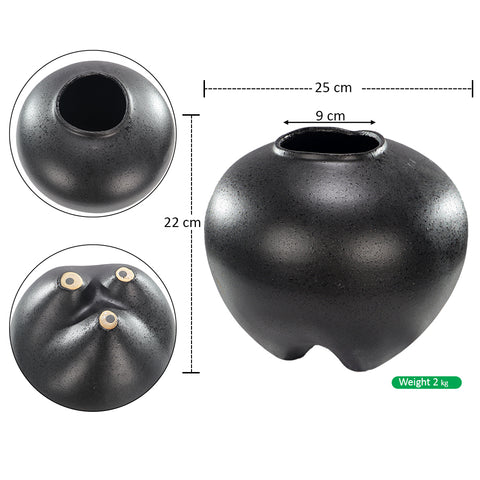 Handmade black ceramic vase with sumo shape