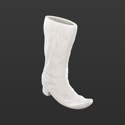 White boots design ceramic vase for stylish home decor