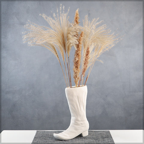 Stylish white ceramic boots vase for floral arrangements