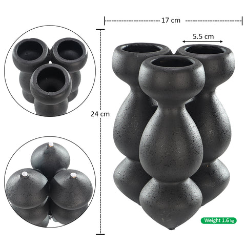 Sculptural black ceramic vase with artistic curves