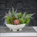 Modern ceramic bowl vase with a sleek finish