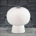 White spherical vase with vintage-inspired design