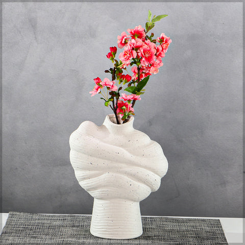 Decorative white vase with smooth finish