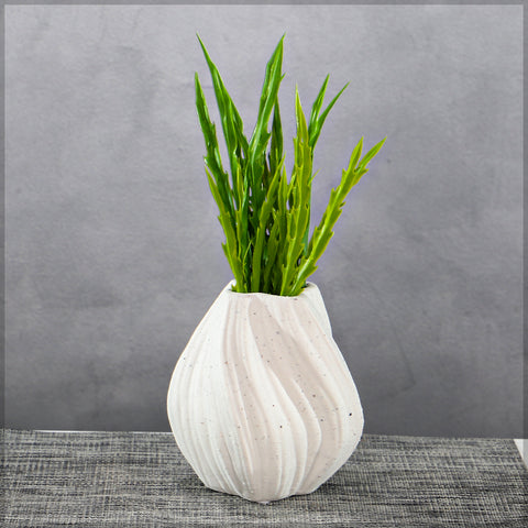 White ceramic vase with geometric pattern