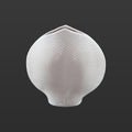 White ceramic vase with leaves pattern for home decor