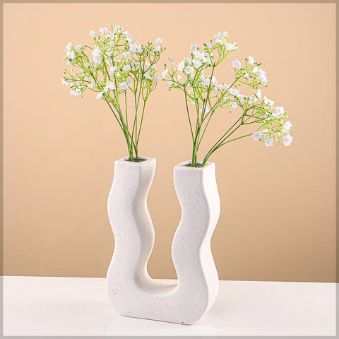 U shaped ceramic vase with wavy design