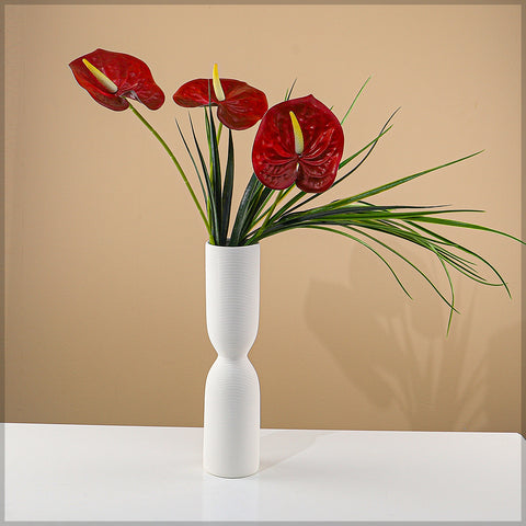 Stylish decorative white ribbed ceramic vase for living rooms