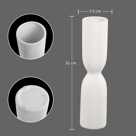 White ceramic vase with ribbed texture for home decor