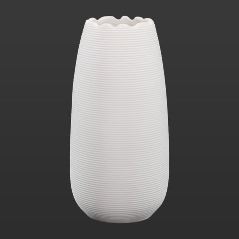 White ceramic vase for home decor in modern interiors