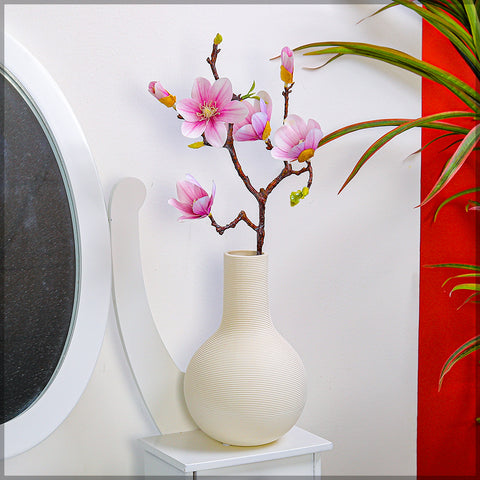 Stylish white ceramic vase for floral arrangements