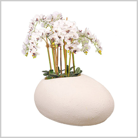 White concrete egg-shaped vase