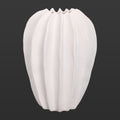 white ribbed design ceramic vase