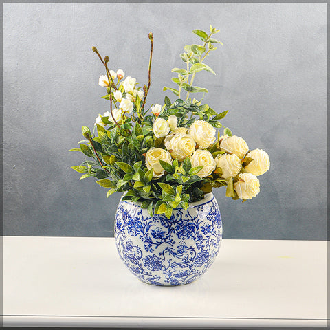 Flower Arrangement in White-Blue Vase