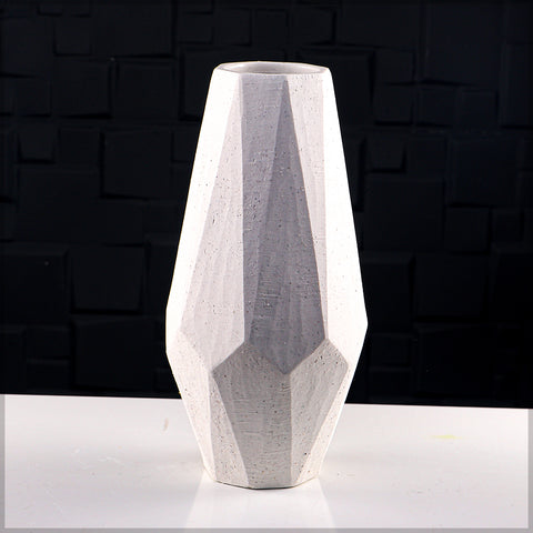 Bold geometric vase in ceramic for contemporary floral displays