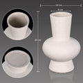 White ceramic vase with a wide opening for modern decor