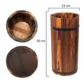 Rustic wooden plant vase in cylindrical shape